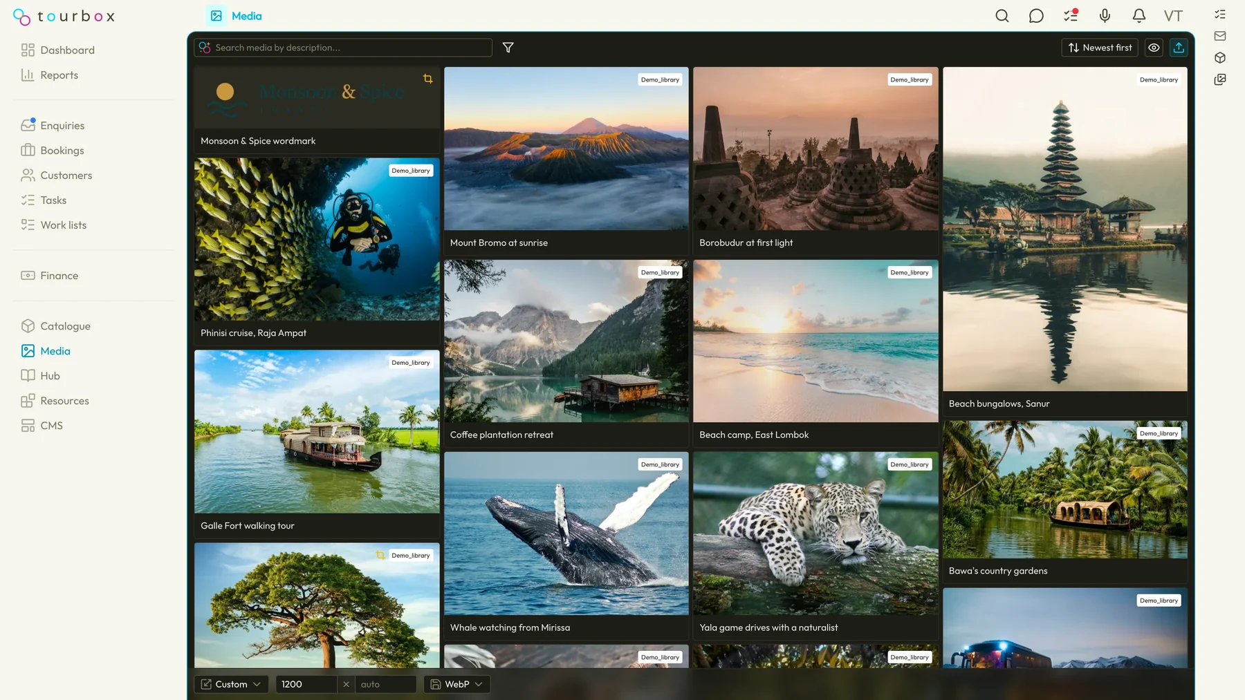 The Tourbox media library, a grid of travel photos with their captions, the search box reading "Search media by description" and the filter, sort and upload controls